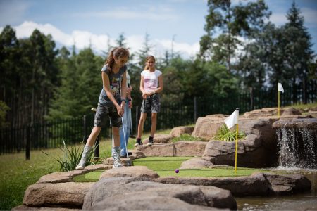 Children playing putt-putt